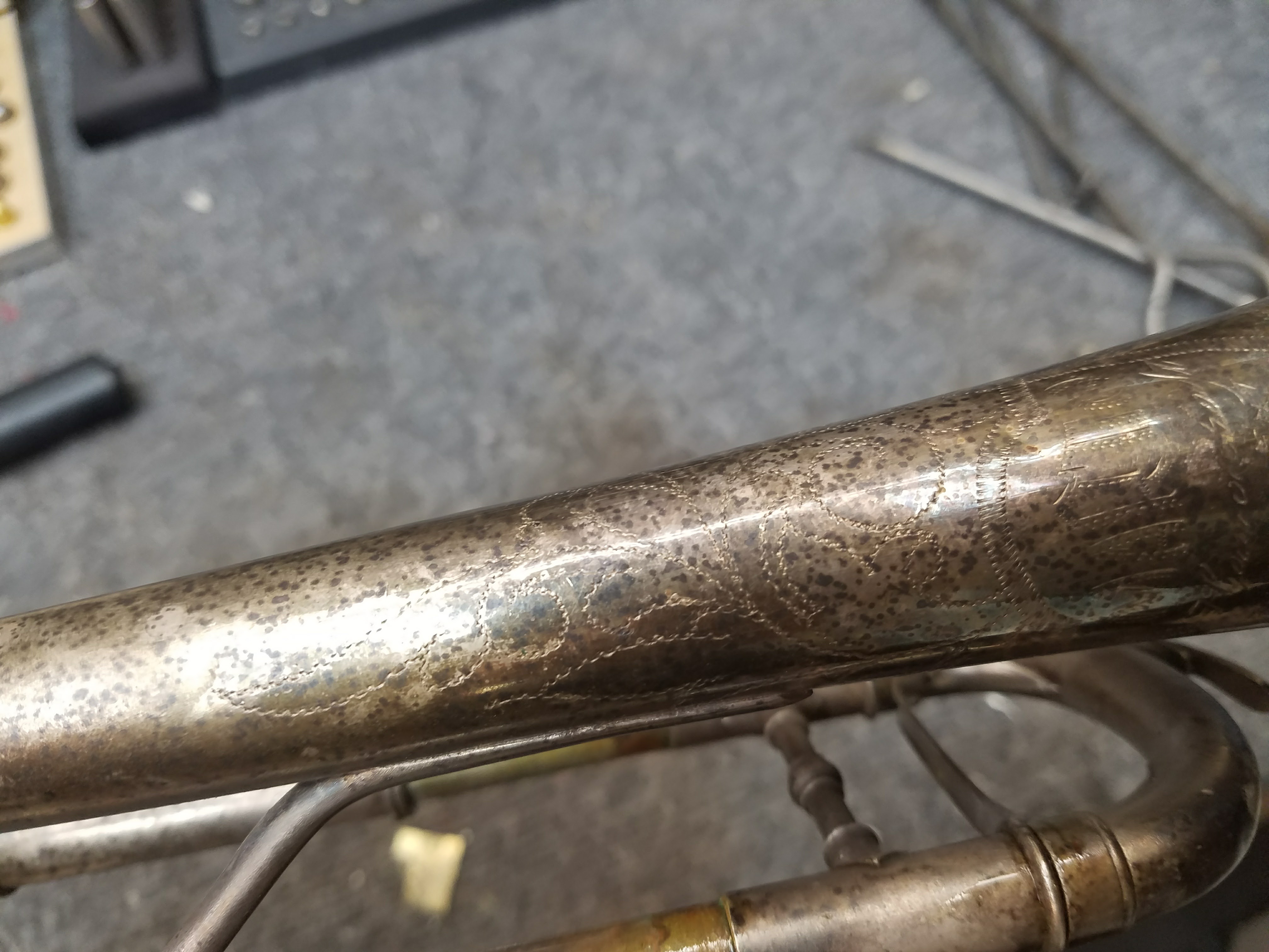 Tube surface before restoration — heavy pitting and corrosion