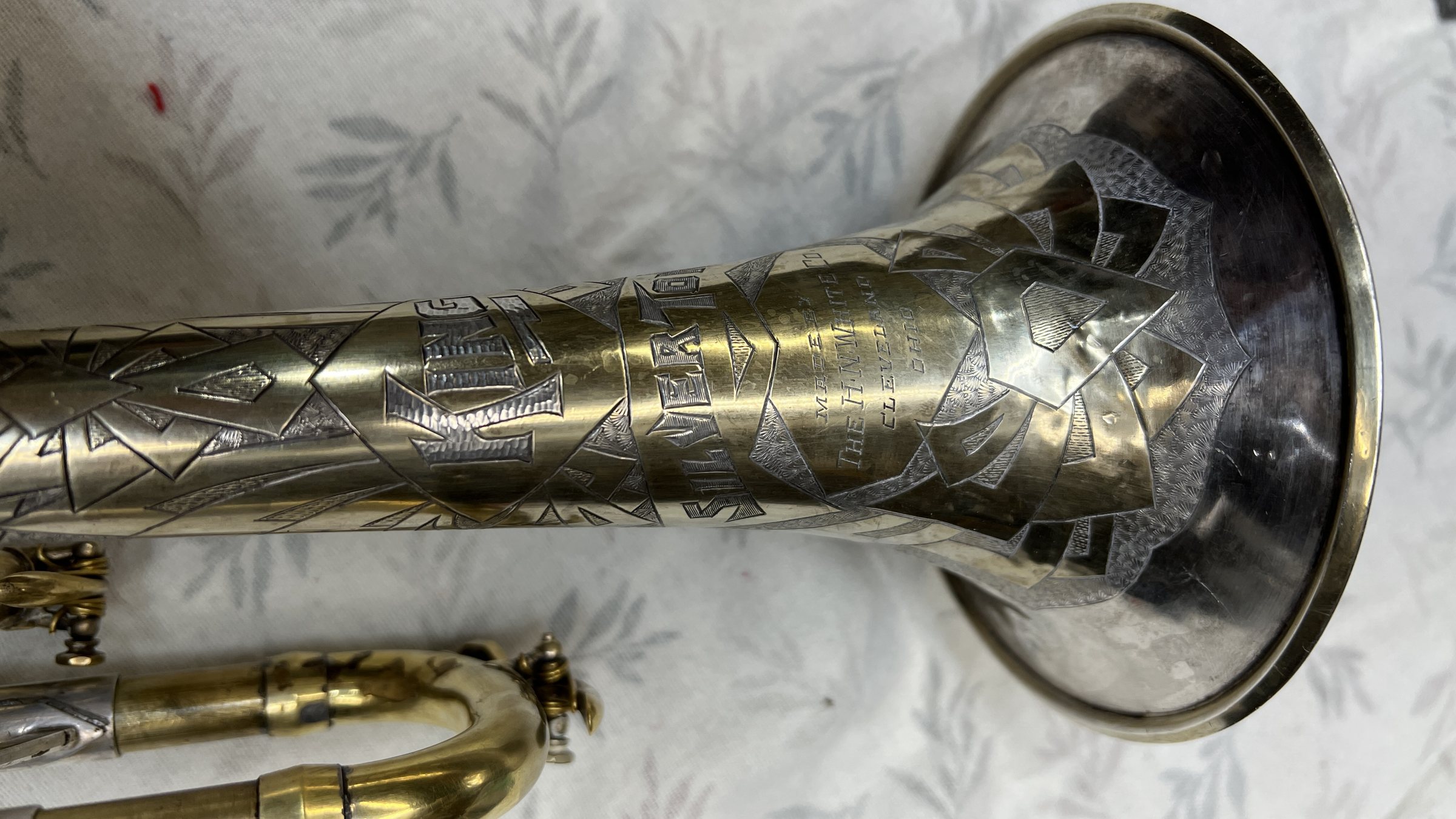 King Silvertone engraving, made by the H.N. White Co., Cleveland, Ohio